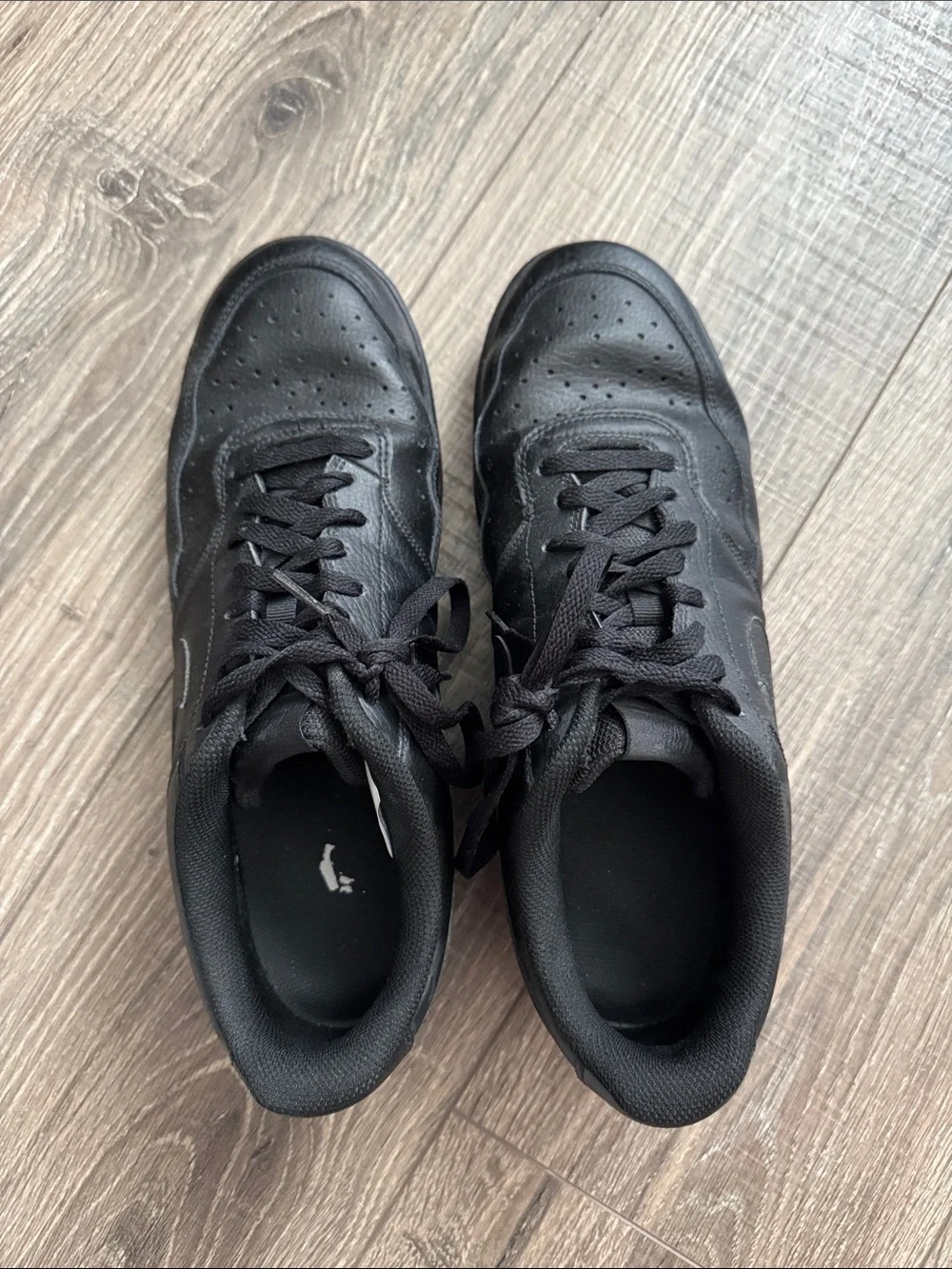 Nike Men’s All-Black Low-Top Leather Sneakers